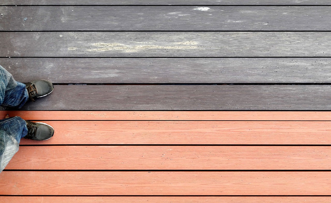 Outdoor plastic composite wood-plastic floor, river embankment, brown